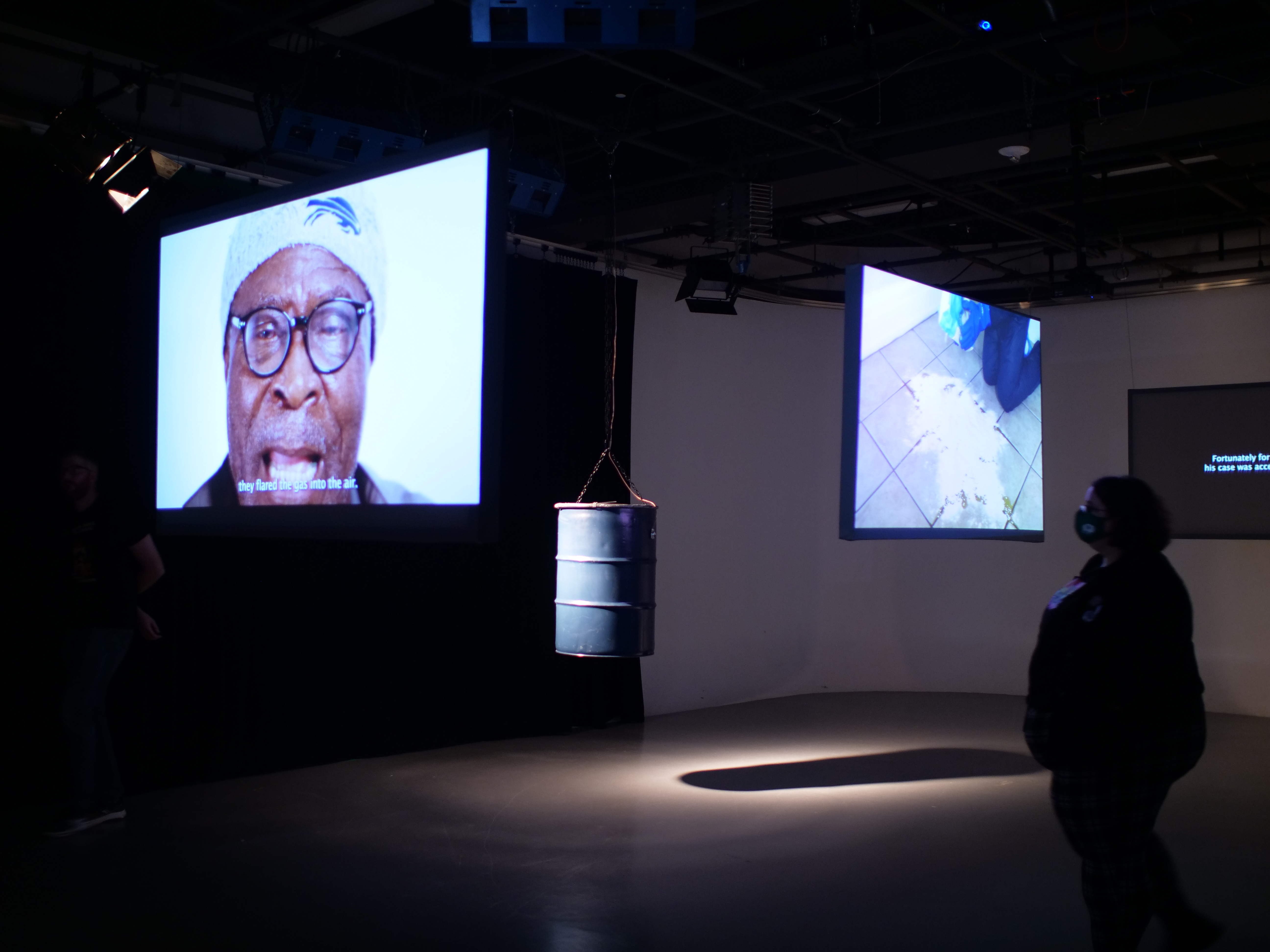 Side view of projections and oil drums