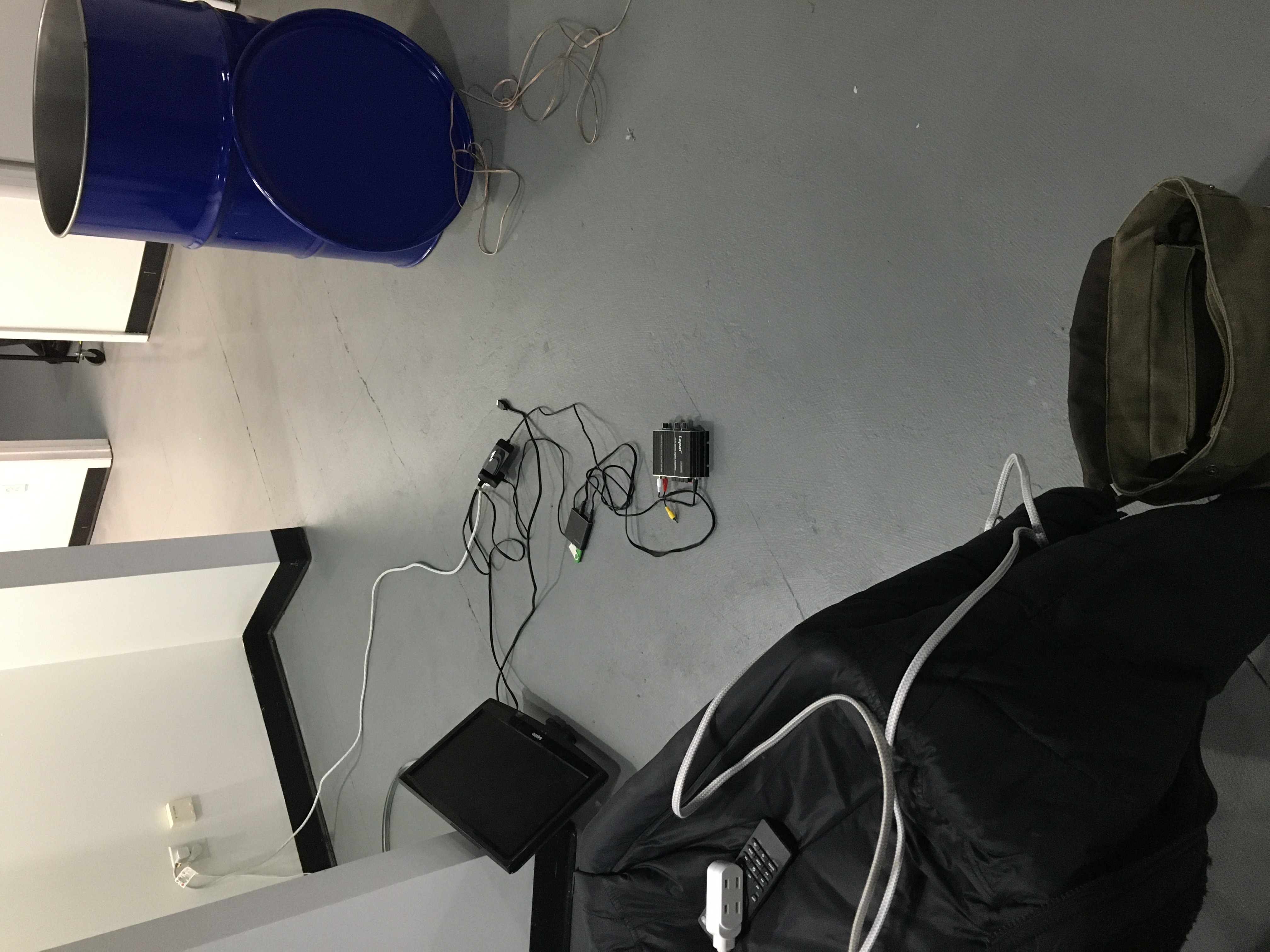 Installation setup with audio equipment and oil drum