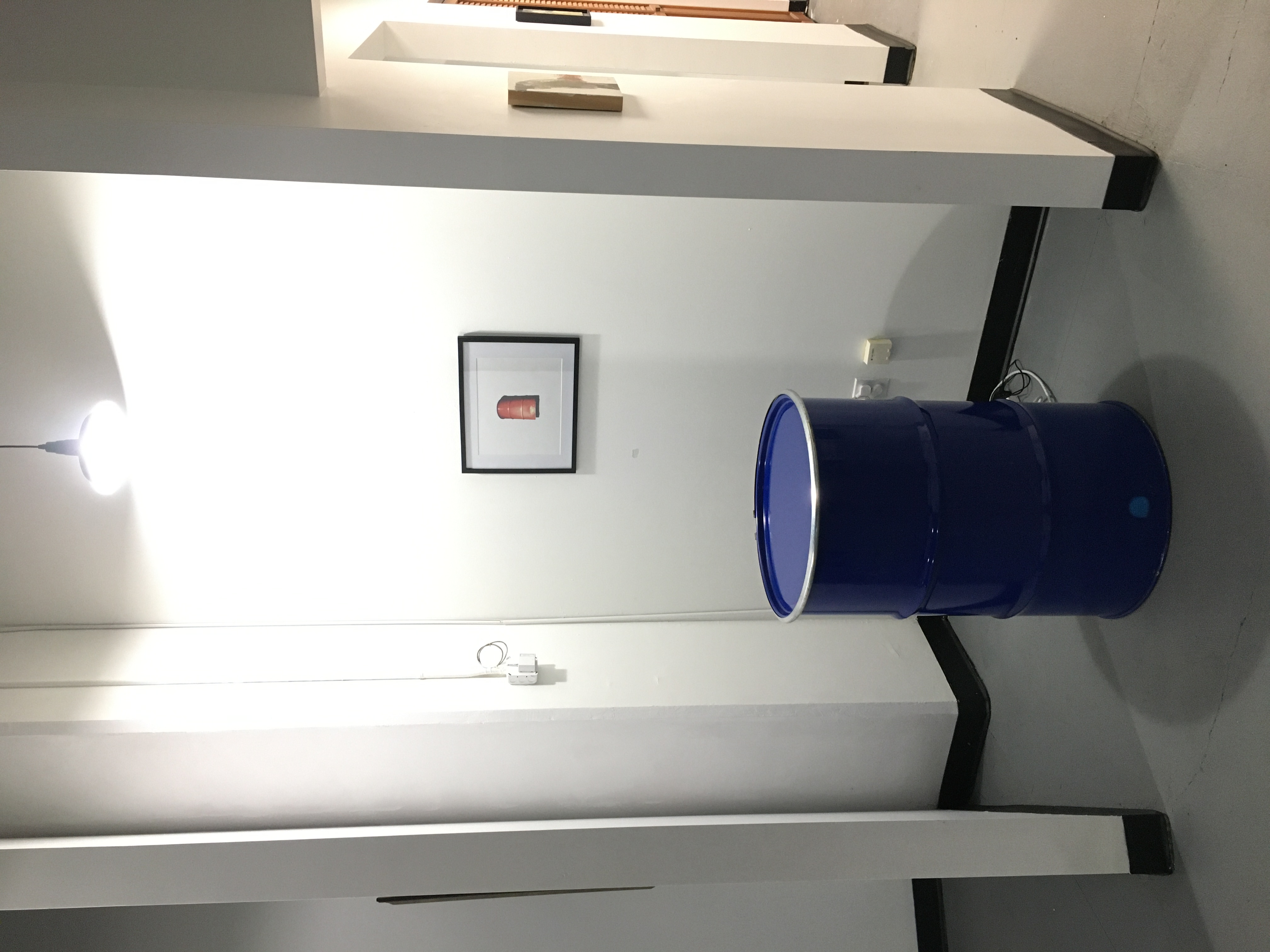 A blue oil drum in the Great Arrow Art Gallery (2023)
